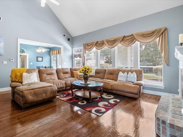 living room with hardwood / wood-style flooring, plenty of natural light, and ceiling fan