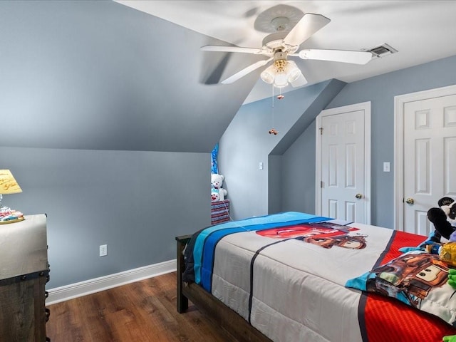 bedroom featuring ceiling fan, lofted ceiling, and dark hardwood / wood-style floors