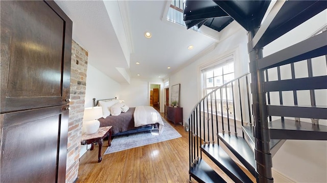 bedroom with light hardwood / wood-style floors