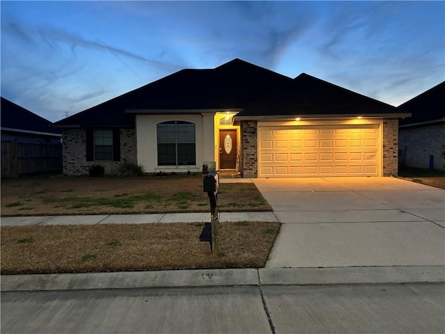 ranch-style home with a garage