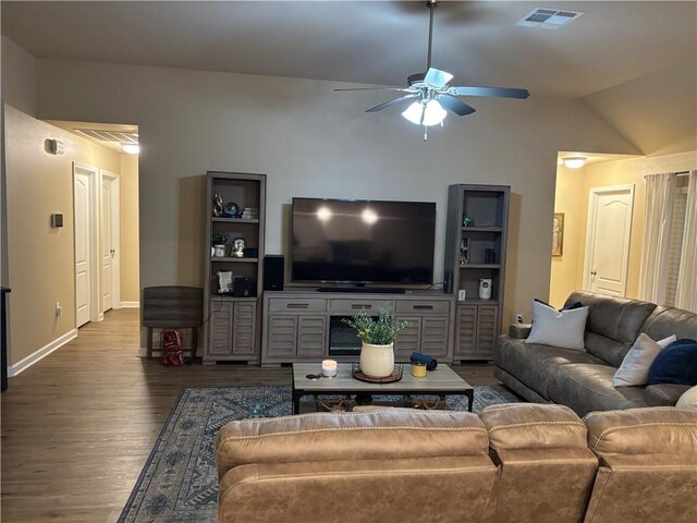 living room with vaulted ceiling, ceiling fan, and hardwood / wood-style floors