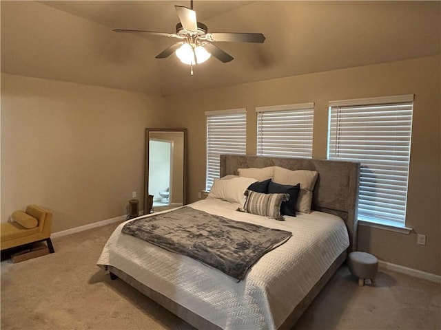 carpeted bedroom featuring ceiling fan and lofted ceiling