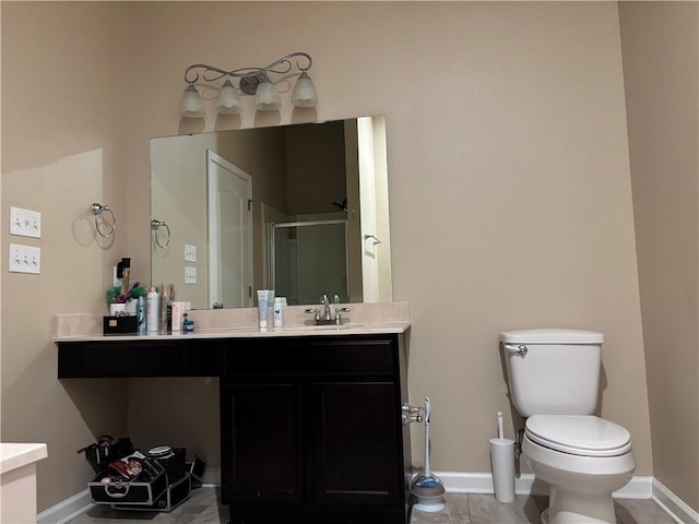 bathroom with vanity, toilet, an enclosed shower, and tile patterned flooring