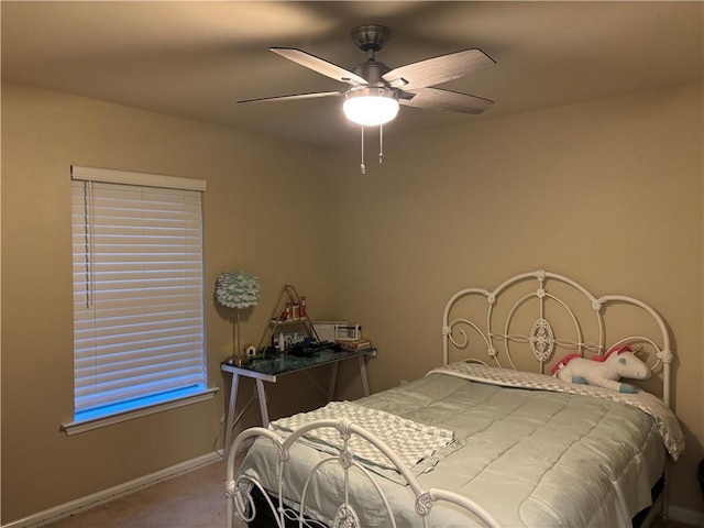 bedroom with ceiling fan and carpet