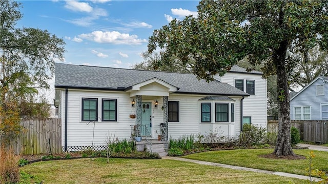 view of front of property with a front lawn