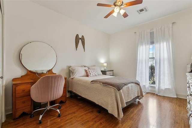 bedroom featuring wood-type flooring and ceiling fan