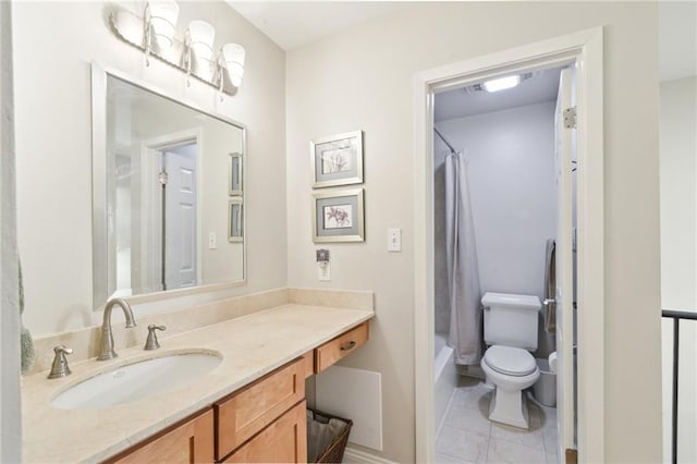 full bathroom with vanity, toilet, tile patterned flooring, and shower / bath combo