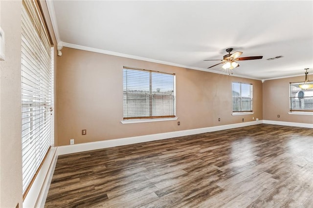 unfurnished room featuring ceiling fan, ornamental molding, and dark hardwood / wood-style flooring