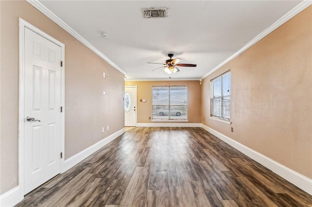 unfurnished room with dark wood-type flooring, ceiling fan, and ornamental molding