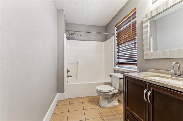 full bathroom with washtub / shower combination, tile patterned floors, toilet, a textured ceiling, and vanity