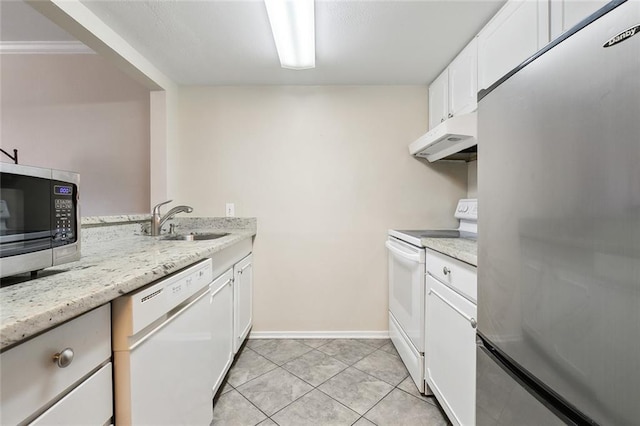 kitchen featuring sink, white cabinets, light tile patterned floors, light stone counters, and stainless steel appliances