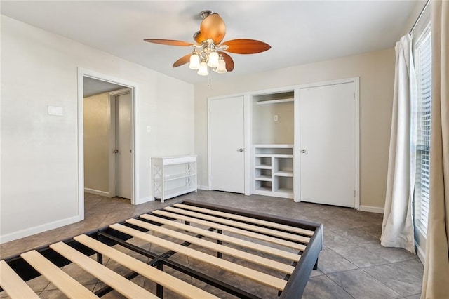 unfurnished bedroom featuring ceiling fan