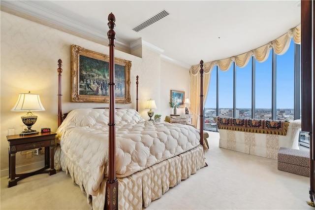 carpeted bedroom featuring crown molding