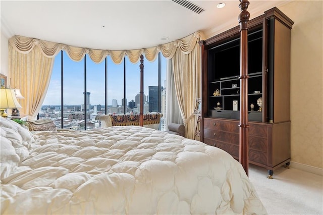 carpeted bedroom featuring access to outside