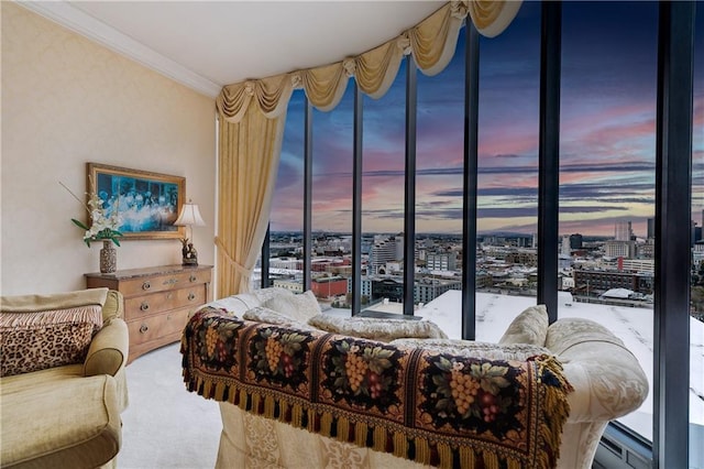 bedroom featuring ornamental molding and carpet floors