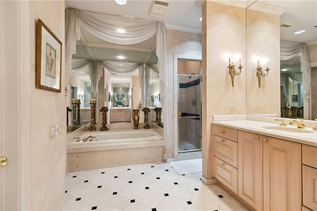 bathroom featuring ornamental molding, vanity, and plus walk in shower