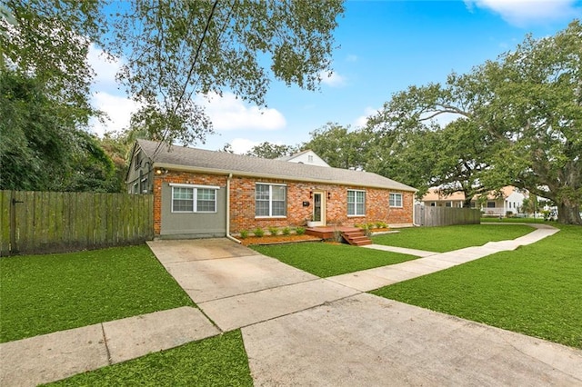 ranch-style house with a front lawn