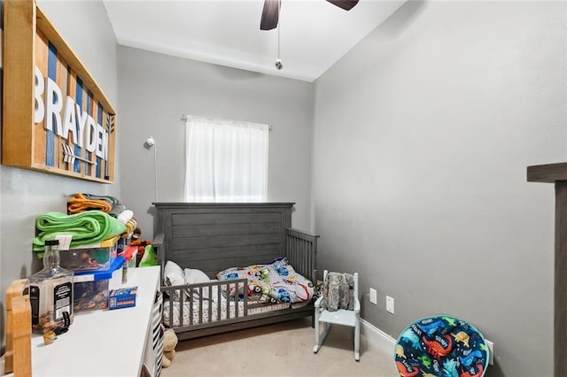 carpeted bedroom with ceiling fan