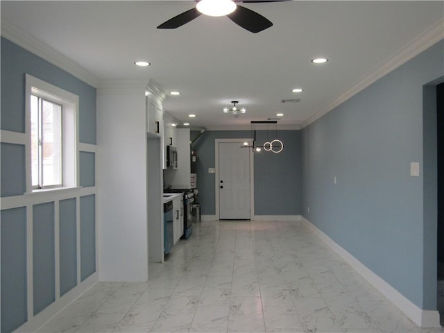 interior space featuring crown molding and ceiling fan