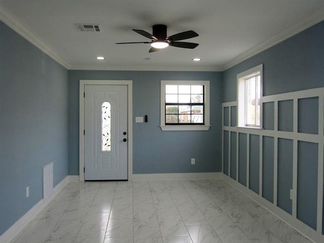 entryway featuring crown molding and ceiling fan