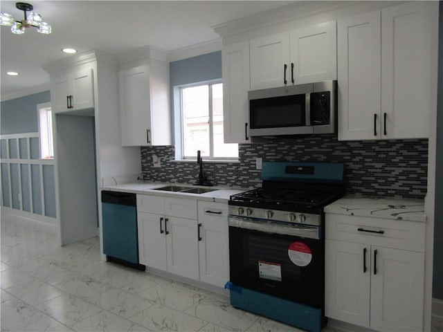 kitchen featuring sink, ornamental molding, stainless steel appliances, decorative backsplash, and white cabinets