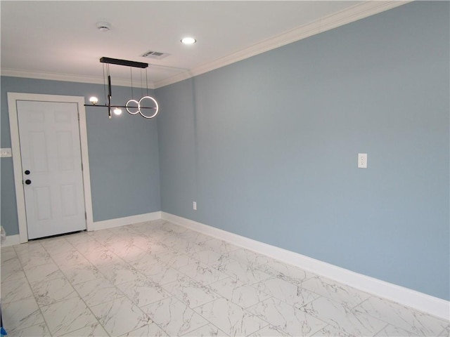 empty room featuring a notable chandelier and ornamental molding