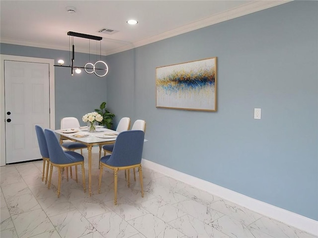 dining area with an inviting chandelier and ornamental molding