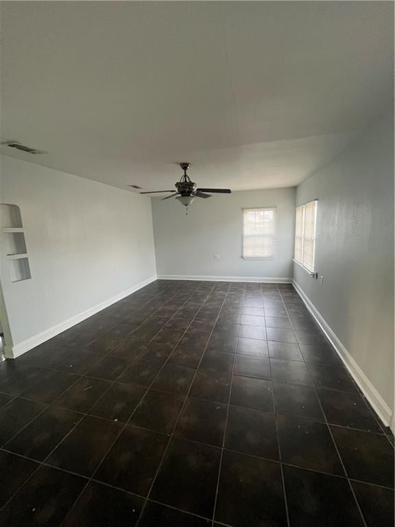 empty room with ceiling fan