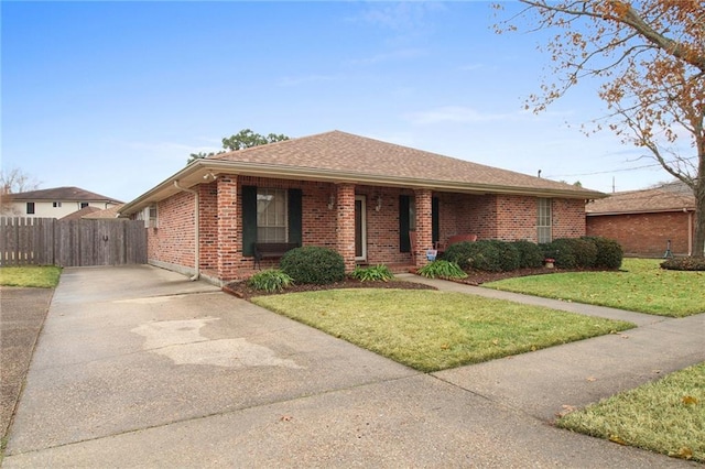 ranch-style house with a front lawn