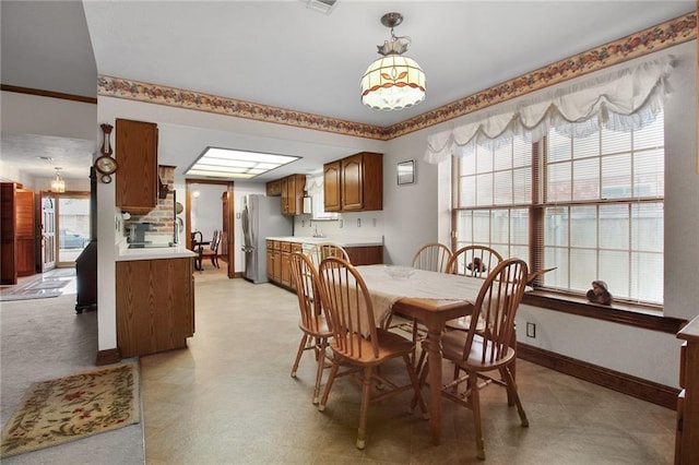 dining room featuring a healthy amount of sunlight