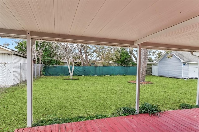 view of yard with a deck