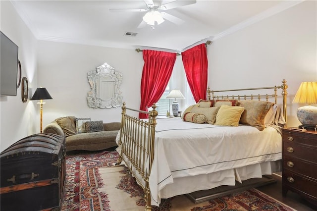 bedroom featuring crown molding and ceiling fan