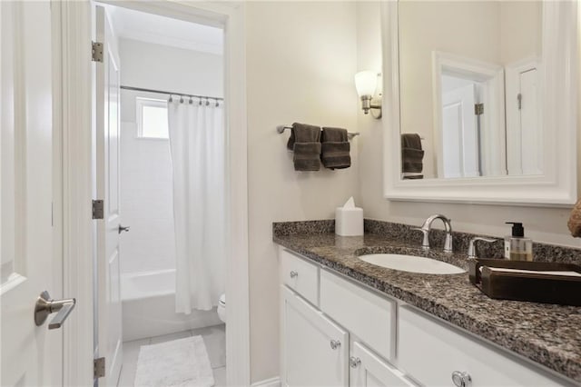 full bathroom with vanity, tile patterned floors, shower / bath combination with curtain, and toilet