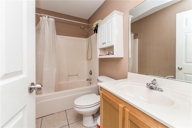 full bathroom featuring vanity, shower / bath combo, tile patterned floors, and toilet