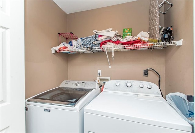 laundry area with washer and clothes dryer