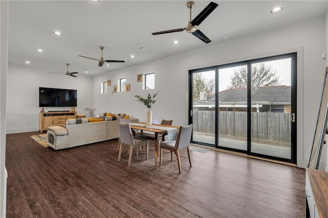 dining space with dark wood-type flooring