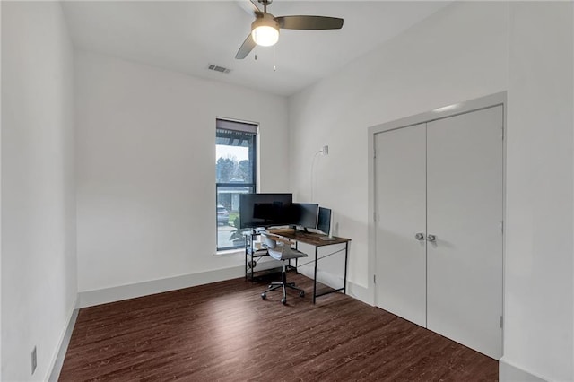 office featuring dark wood-type flooring and ceiling fan