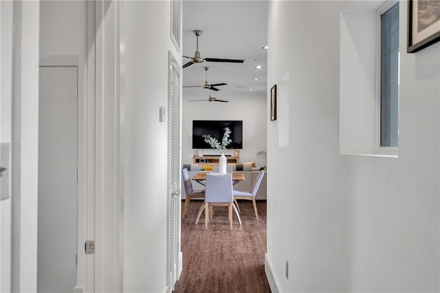 corridor featuring hardwood / wood-style floors