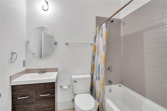 full bathroom with vanity, toilet, and shower / bath combo with shower curtain