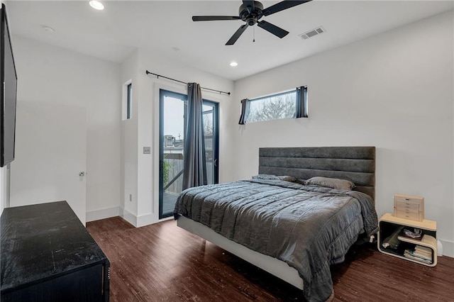 bedroom featuring dark wood-type flooring, ceiling fan, and access to exterior