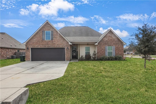 front of property with a garage, central AC, and a front yard