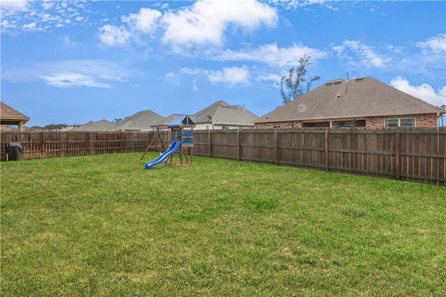 view of yard featuring a playground