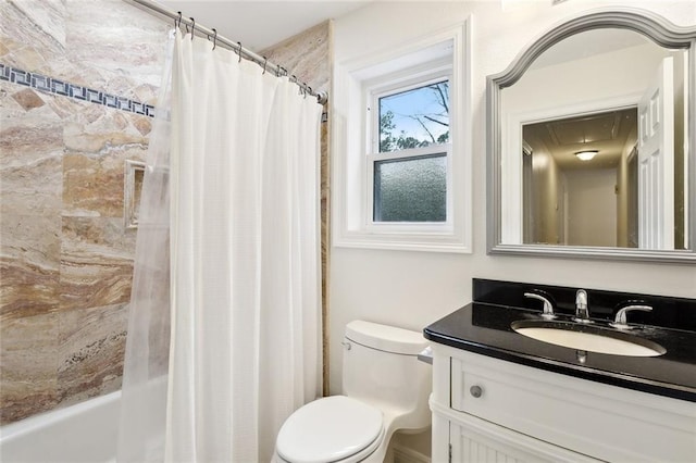 full bathroom featuring shower / bath combination with curtain, vanity, and toilet