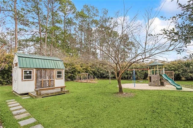 view of yard featuring a shed and a playground