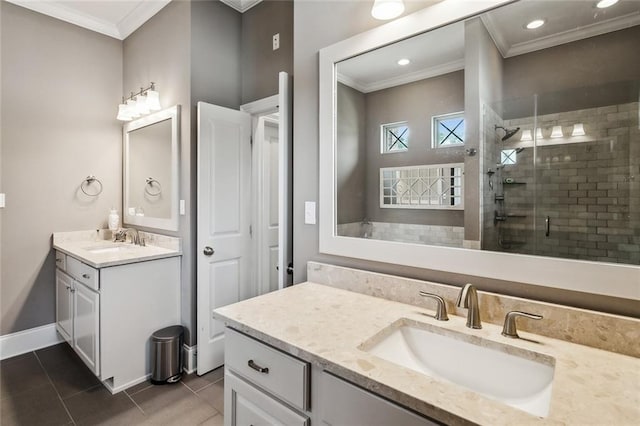 bathroom with tile patterned flooring, vanity, ornamental molding, and walk in shower