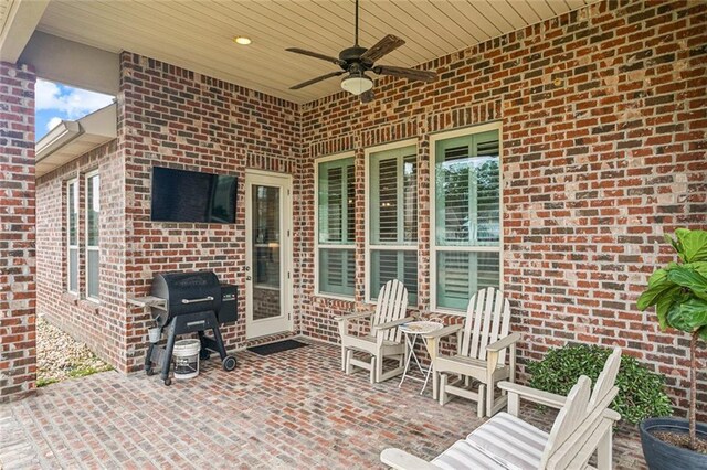 view of patio / terrace featuring ceiling fan and area for grilling