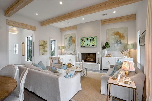 living room featuring beamed ceiling