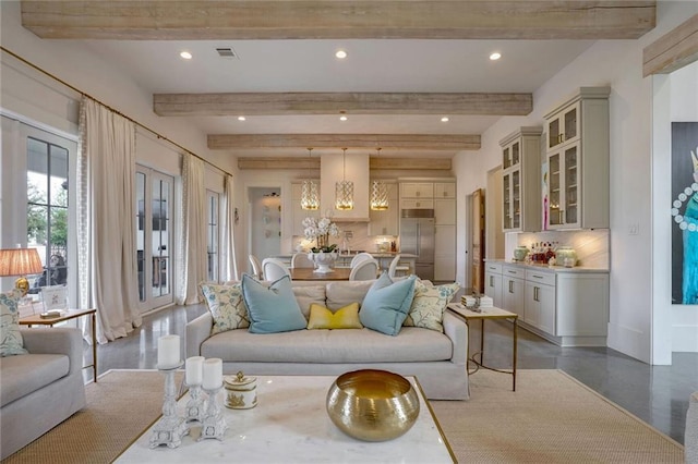 living room with beam ceiling