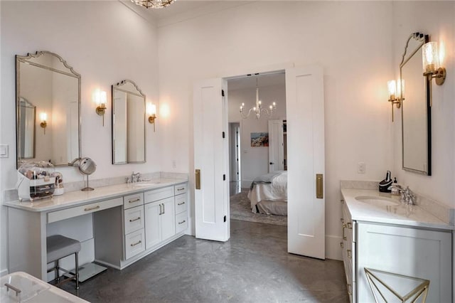 bathroom featuring vanity, a notable chandelier, and concrete floors