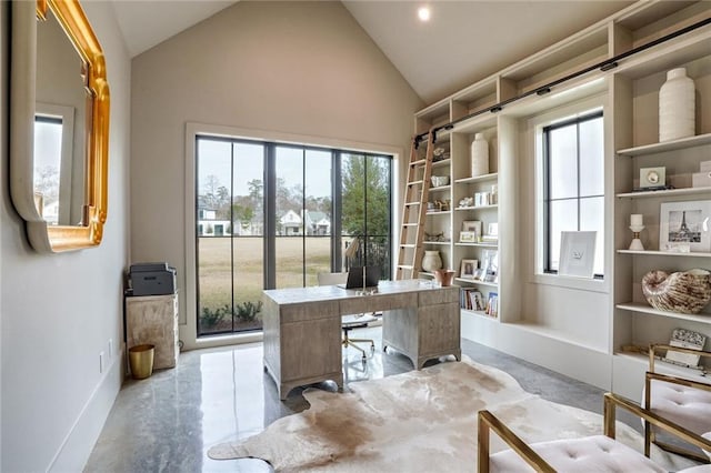 office area with vaulted ceiling